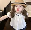 Conjunto de Niña 2026 Verano Nuevo Estilo Bordado Floral Infantil Holgado Línea A Camisa Muñeca Shorts de Encaje Color Sólido Moderno