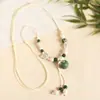 Collar con colgante de campana de mariposa de cerámica de estilo étnico retro para mujer, diseño nuevo y moderno, cadena larga para suéter, accesorios