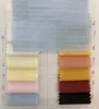 Xiaojun textil nueva tela china gasa de algodón tela jacquard a cuadros vestido camisa ropa para niños