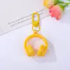 Llavero colgante de resina 3D colorido para auriculares, correa de teléfono versátil estilo ins, accesorio para bolso, decoración DIY