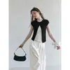 Camiseta TGGTA negra de imitación de dos piezas con manga corta para mujer, nuevo diseño de verano 2026, top corto ajustado