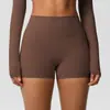 En stock shorts de yoga de color sólido a doble cara cepillados de cintura alta ajustados que realzan los glúteos para mujer, adecuados para correr y actividades de fitness