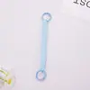 Accesorios Pindou cordón de resorte de plástico llavero de cordón de resorte cordón retráctil de resorte para teléfono móvil anti-pérdida llavero de doble anillo