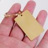 En stock acero de titanio personalidad simple geométrico rectangular llavero accesorios etiqueta colgante lisa grabada con láser