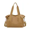 Bolso Casual Urbano de Nylon para Mujer 2025 Invierno Nuevo Gran Capacidad Bolso de Hombro y Mano para Mujer Bolso Cruzado Casual de Color Sólido