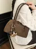 Bolsa Feminina Minimalista de Nicho 2026 Novo Inverno Moda de Alto Padrão Versátil Bolsa de Ombro Casual para o Dia a Dia Bolsa de Ombro