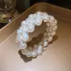 Pulseras Abiertas Europeas y Americanas con Perlas Incrustadas de Diamantes para Mujer, Pulseras de Diseño de Nicho Exagerado a la Moda, Joyería de Lujo Ligero y de Alta Gama al por Mayor