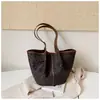 Bolso retro casual de gran capacidad para mujer, nuevo bolso de mano otoño 2026, bolso tipo cesta de hombro único de gran capacidad