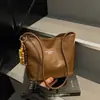 Bolsa Saco Retro de Luxo Nicho Feminina 2026 Nova Tendência Moda Coreana Versátil Bolsa de Ombro Bolsa de Axila Feminina