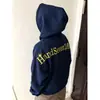 Sudadera con capucha bordada estilo retro americano, una prenda holgada y versátil para otoño/invierno para parejas, con un diseño moderno y sofisticado