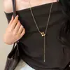 Collar con borla de flor de piedra ojo de tigre vintage para mujer, una pieza lujosa y de alta gama, una cadena para suéter única, versátil y elegante para otoño e invierno