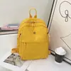 Mochila ultraligera, modelo nuevo 2026, mochila de lona de nailon de alta gama para nicho, para el trabajo, los desplazamientos y los viajes, pequeña y ligera