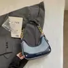 Bolso de Hombro Exquisito Súper Popular para Mujeres, Moda de Verano Trendy Nuevo 2026 Bolso Versátil de Hombro Cruzado en Forma de Media Luna