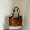Bolsa Versátil de Grande Capacidade Moda Transfronteiriça 2026 Nova Retro Versátil Toque de Luxo Bolsa de Ombro Única Bolsa Tote Simples
