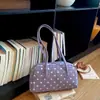 Bolsa de lunares de moda para mujer 2026 Verano Nuevo de moda Gran capacidad Bolso de un solo hombro Elegante Versátil Bolso para el trabajo y el hombro