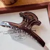 Clip de resorte de mariposa de PC de 13 cm del Arco de Triunfo Transfronterizo Pinza de tiburón de alta gama para el cabello Accesorios para el cabello