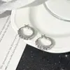 Nuevos Pendientes de Moda Europeos y Americanos de Nicho para Mujer, Aros Elegantes Huecos con Circonita Púrpura tipo Diamante Venta al por Mayor