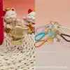 Colgante de oro de perro canela de oro puro 999, serie Sanrio, cachorro aterciopelado con cordón, regalo de tienda de oro, coleccionable, adecuado para regalar