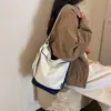 Bolsa tote de lona color-blocking estilo coreano para mulheres, novo modelo 2026, grande capacidade, bolsa de ombro versátil, bolsa de axila casual artística