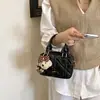 Bolso pequeño de rejilla de diamantes para mujer 2026 nuevo bolso de hombro individual de moda mini bolso tipo bowling bolso cruzado pequeño versátil