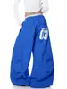 Suministro Exclusivo Transfronterizo Marca de Moda Estilo Americano Estampado de Letras Pantalones de Paracaidista Plisados tipo Cimitarra Unisex Pantalones de Pierna Ancha Sueltos para Danza Jazz