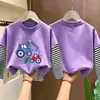 Camiseta de manga larga para niño 2026 nuevo modelo, camiseta básica de dibujos animados para niño, camiseta interior de algodón puro a rayas para otoño, estilo primavera y otoño