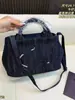 Bolso de mano vintage de mezclilla de diseño de alta gama, gran capacidad, simple y versátil para vacaciones y para ir al trabajo, se puede usar como bandolera o bolso de hombro para la playa