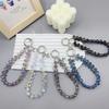 Adornos colgantes de cristal de fresa de alta gama, ligeros y de lujo, accesorios de moda para perros Bleo, cadena para teléfono móvil, colgante de libro de equitación rojo
