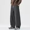 Pantalones casuales holgados rectos negros para hombre, tendencia otoño e invierno 2026, nuevos pantalones deportivos transpirables estilo americano para hombre