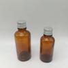 Botella de vidrio para aceite esencial de 5ml-100ml, botella de vidrio para producto para el cuidado de la salud, tapa de aluminio, punto de fábrica, botella de vidrio transparente marrón
