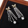 Pendientes de plata con borlas de perlas y lazo de diamantes súper brillantes de Dongdaemun, de Corea del Sur, para mujer, de alta gama, con forma de gota