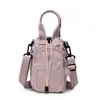 Bolsa Transversal Personalizada Estilo Coreano para Celular Feminino 2026 Nova Nicho Outdoor Bolsa para Garrafa de Água Bolsa de Ombro Simples Colorida da Moda