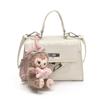 Bolsa Kelly de Mão Retrô de Nicho para Mulheres 2025 Novo Estilo Coreano Cor Pura Casual Bolsa com Fecho Texturizada Bolsa Transversal Fashion