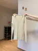 Elegante camisa básica de cuello para mujer, corte ajustado, otoño e invierno, pura y deseable, tacto de alta gama, top de punto de manga larga en blanco