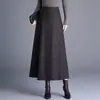 Falda de lana de corte A con estampado de leopardo de moda para mujer, nuevo estilo otoño e invierno 2026, de cintura alta, que cubre la cadera, con dobladillo amplio, moderna y rejuvenecedora