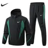 Conjunto deportivo casual de otoño nuevo transfronterizo para hombre, chaqueta fina con capucha de bloques de color de moda y pantalón, conjunto de dos piezas