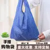 Bolsas de compras portátiles ecológicas al por mayor del fabricante, bolsas de compras para tiendas de ropa, bolsos de mano, bolsas de compras plegables de tela Oxford