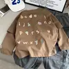 Ropa infantil coreana, camiseta de manga larga para niño, diseño de estilo callejero de otoño, top de imitación de dos piezas, camiseta infantil