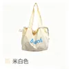 Bolsa Estilo Coreano Nova com Estampa de Letras Bolsa de Ombro de Nylon Feminina de Grande Capacidade Casual Versátil Portátil Bolsa Tote com Cordão