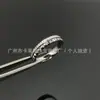 Anillo Giratorio de Engranajes Baojia Shilong Anillo de Cerámica Blanco y Negro para Pareja Estrella Roja Popular en Línea Mismo Anillo Venta al por Mayor