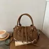 Bolso de mano con textura de tendencia transfronteriza, bolso tipo almohada para mujer, nuevo de Otoño 2026, color liso, con remaches, bolso de hombro único, bolso cruzado para el día a día