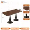 Mesa redonda de madera maciza estilo panadería con sillas tapizadas, diseño minimalista, adecuada para cafeterías, mesas de reuniones, sillas de comedor, ocio moderno y entornos de té de la tarde
