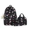 Mochila de dibujos animados para estudiantes, estilo coreano versátil, mochila de campus para estudiantes de primaria, ligera de nailon, mochila escolar de tres piezas