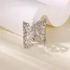 Anillo Geométrico de Acero Inoxidable Diseño Transfronterizo Europeo y Americano Nuevo Serpiente Cruz Diseño 18K Chapado en Oro Abierto Ajustable