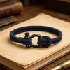 Pulsera de Moda Transfronteriza Europea y Americana Brazalete Tejido para Hombres Cierre de Acero Inoxidable Cuerda Roja de Mano para Pareja Joyería para Estudiantes