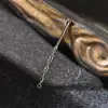 Colgante de orejera creativo único y simple, orejera con mango de bambú de cobre puro, llavero colgante para limpieza de oídos al por mayor