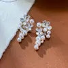 Pendientes de Borla de Perla con Pétalos Incrustados de Diamantes de Moda Sencilla para Mujer con Lujo Ligero y Diseño Único Pendientes al por Mayor
