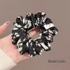 Estilo Otoño e Invierno Estampado de Leopardo de Gama Alta Pequeño Floral Cuerda para el Cabello Elegante Cola de Caballo Cuerda para el Cabello Estilo Coreano Versátil Anillo Pequeño de Intestino Banda Elástica