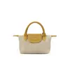 Bolso Mini Nuevo Otoño e Invierno 2025, Bolso de Mano de Cuero de Vaca de Hombro Único Cruzado, Bolso Dumpling Versátil de Moda de Nicho