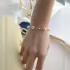 Nuevo brazalete de perlas japonés perla pequeña lujo ligero exquisito estilo pequeño libro rojo combinable estilo ins